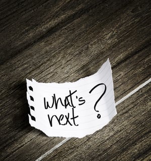 Whats Next notepaper on the wood background